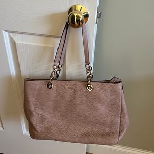 Authentic Kate Spade blush pink tote with gold hardware on handles